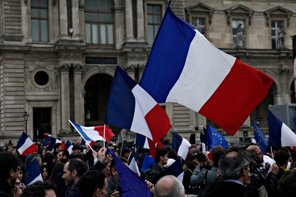 Supporters,Of,French,Presidential,Election,Candidate,Emmanuel,Macron,Wave,French manifestation franchouillarde