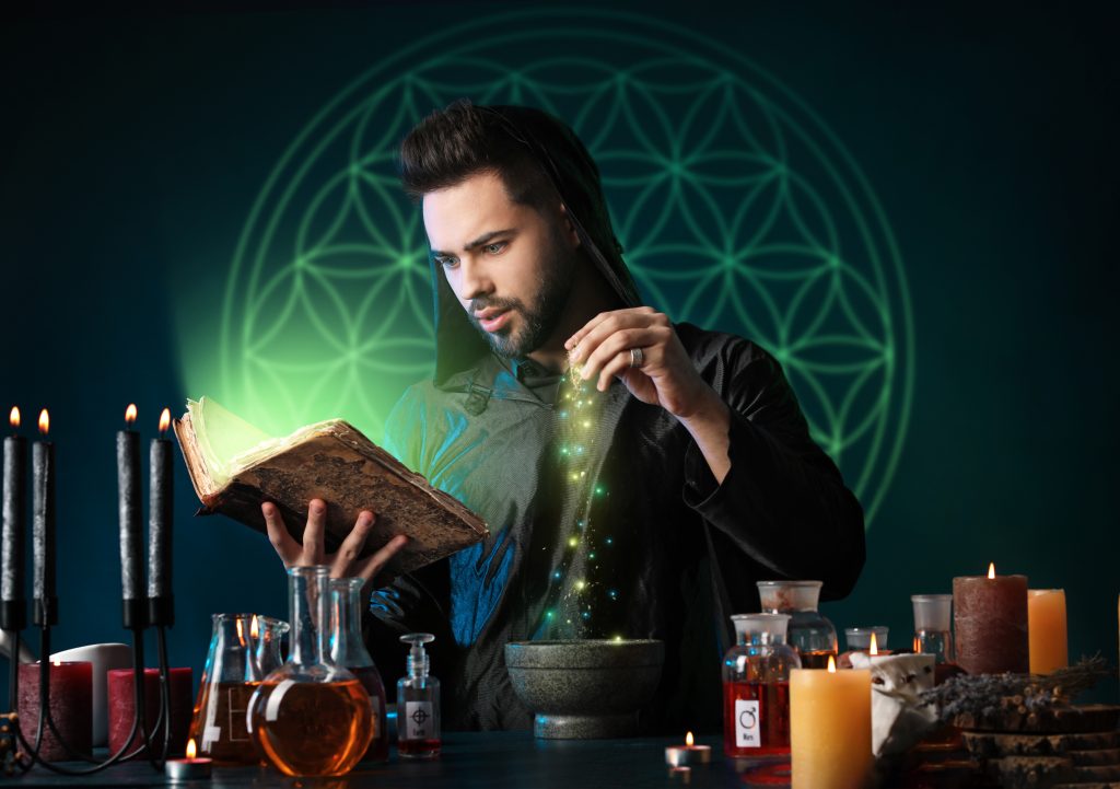 Alchimiste mettant de la lumière dans un bol athanor