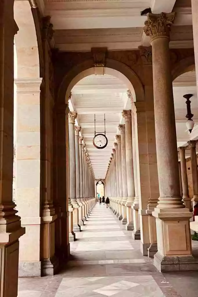 Elegant arches and columns inside Mill Colonnade, Karlovy Vary, Czechia.
